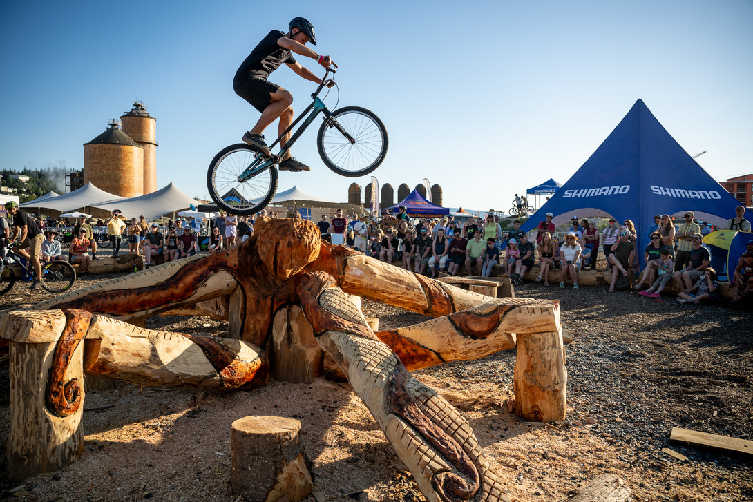 Thrilling trials bike display at Whatcom County's Waypoint Bike Park next to the main music stage